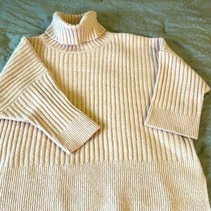 Turtleneck tunic sweater; light peach